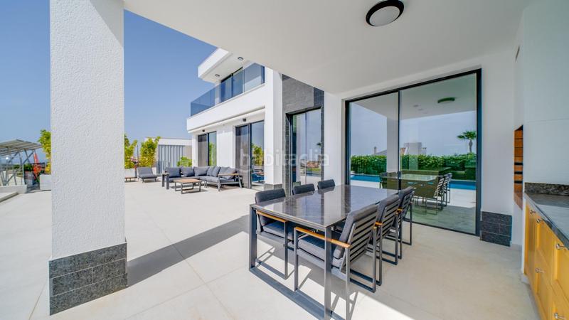 Foto 8d86aeea-2282-4c4d-a936-81fd67319a6a. Chalet con riscaldamento parcheggio piscina in Golf Bahía Finestrat