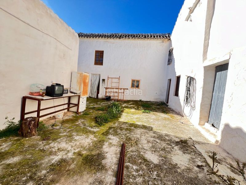 Foto fb4865d4-1b3a-42bc-b299-8f1e39d44c71. Masia amb calefacció aparcament a Centro Antequera