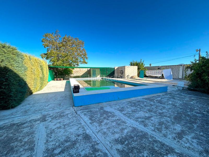 Foto 83311dd5-5383-4c7a-a005-e20d6fda5641. Masia amb aparcament piscina a Zona de la Vega Antequera