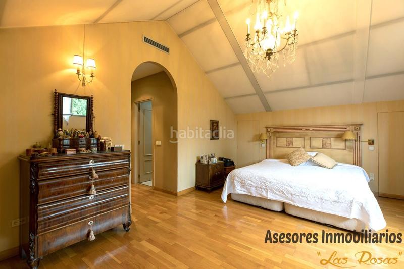 Foto 27e2f241-c713-4655-b9db-48ab7ed0547e. Casa adossada amb calefacció aparcament a Peñagrande Madrid