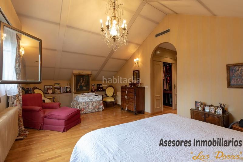 Foto 7bd01f3c-b660-4a30-a3ea-7e8ab29e3a85. Casa adossada amb calefacció aparcament a Peñagrande Madrid