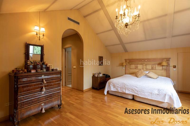Foto e9b9cce0-c4cf-477e-8fb8-e5e62513d703. Casa adossada amb calefacció aparcament a Peñagrande Madrid