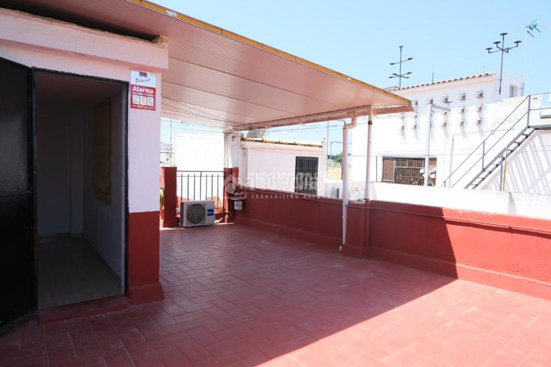 Foto c476dad2-5196-471f-b2d7-ded9bbd150e3. Casa aparellada a El Cerro Sevilla