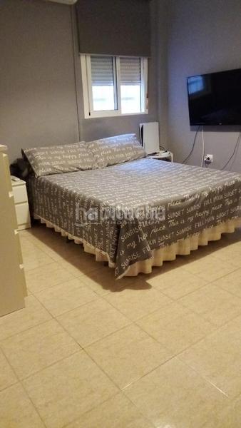 Foto ed7fd228-1cad-4576-9ccd-b914aee7cf25. Casa aparellada a El Cerro Sevilla