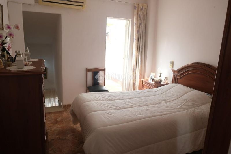 Foto fac00856-0621-4fb3-b6e0-c62beccb0ba2. Casa aparellada a La Plata Sevilla