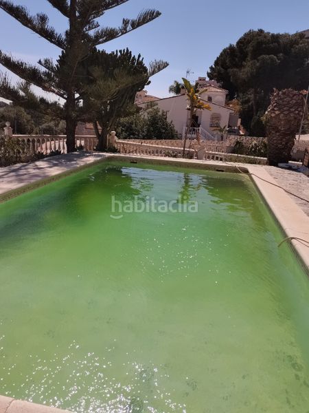 Foto 1d001c6e-1e5a-4c84-8f54-8405d487fc49. Chalet con camino riscaldamento parcheggio piscina in Málaga