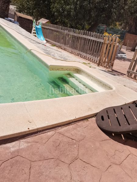 Foto ce567317-0b7f-46d3-96e3-f876bc98c3d8. Chalet con camino riscaldamento parcheggio piscina in Málaga