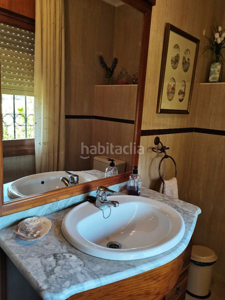 Foto d321af00-3b18-4dd6-a0c2-5793b6db7f2f. Chalet con camino riscaldamento parcheggio piscina in Málaga