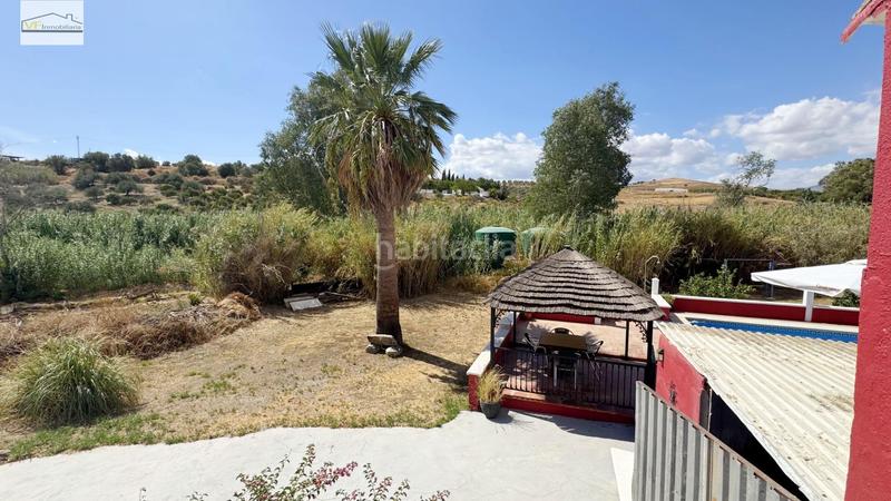 Foto 1034c33f-3434-4b64-81ba-d443d3bef207. Country house with parking pool in Coín