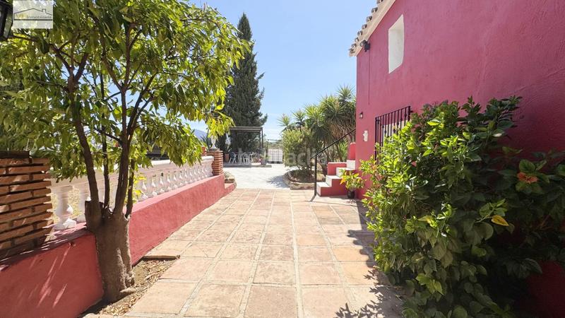 Foto 1c952cd9-d588-4c90-9d8a-e1ecc53e2b25. Country house with parking pool in Coín