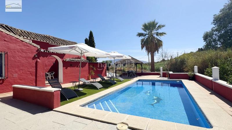 Foto 789cfc0d-d7d8-46a5-9b02-70f4eb03ee71. Country house with parking pool in Coín