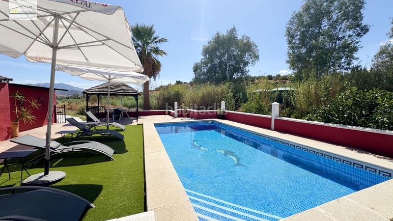 Foto 9215ce8b-fd49-4207-8d69-7b43fcf54c9e. Country house with parking pool in Coín