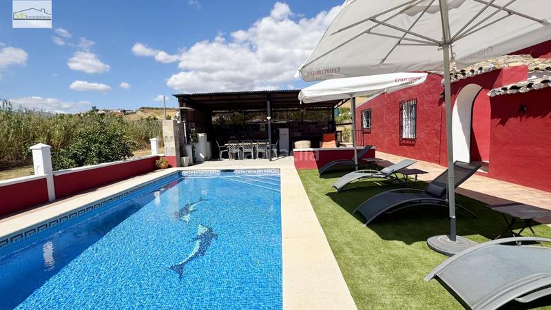 Foto a0a6d75c-9f24-4309-a56b-cd6a18303a23. Country house with parking pool in Coín