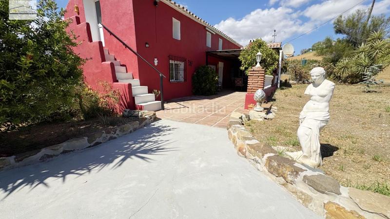 Foto cf4de306-f0aa-4a96-96cc-d486023bddc4. Country house with parking pool in Coín