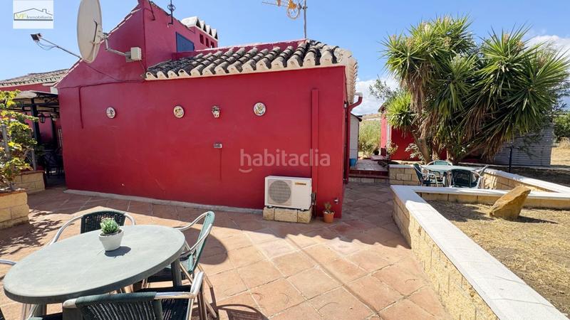 Foto d28063c9-ef58-4530-b47f-f1856db35077. Country house with parking pool in Coín