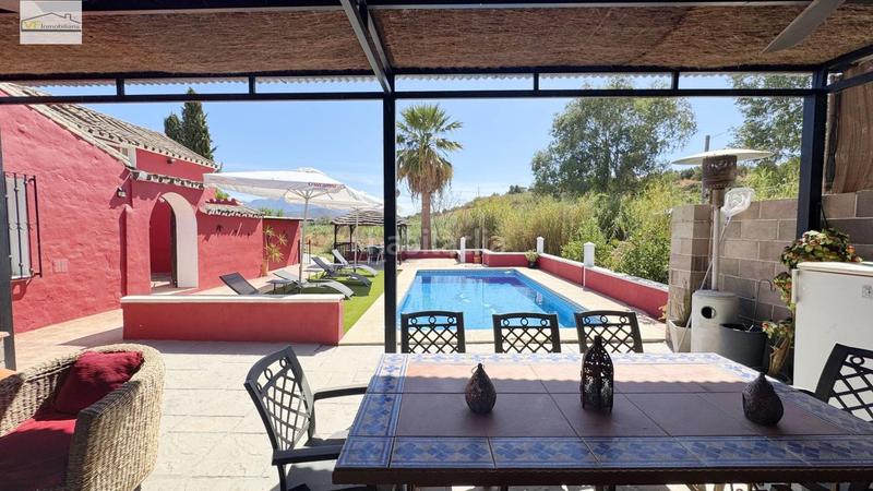 Foto df4885b1-c481-4a7b-87f6-fd47b7cf52d7. Country house with parking pool in Coín