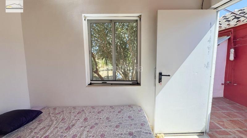 Foto fa1d9b81-b9d1-485b-aed4-d507195b6b25. Country house with parking pool in Coín