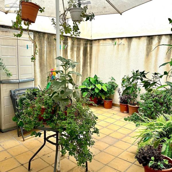 Foto ba4e0c1d-390a-4273-bd2b-1951b7c91e70. Piso un rincón único con patio y garaje incluidos! en Málaga