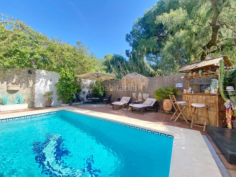 Foto fe15511f-ad1f-42f1-9d06-4a15568ed78e. Doppelhaus mit kamin pool in La Carolina - Guadalpín Marbella
