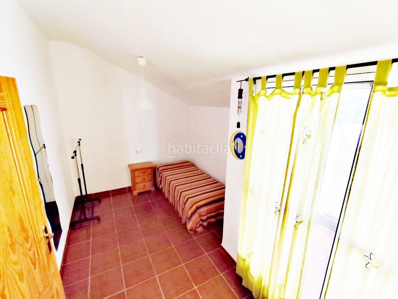 Foto 3c7200a8-ad75-4aad-a5b8-017bbd43dc3c. Casa aparellada amb xemeneia calefacció aparcament piscina a Cártama