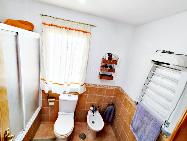 Foto b7736cc6-a467-4cdc-b333-4dfcd43b0b86. Casa aparellada amb xemeneia calefacció aparcament piscina a Cártama