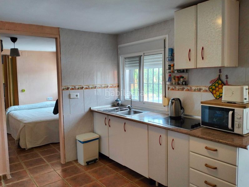 Foto e288a77e-b562-4d0f-a732-6d37840af71d. Masia amb xemeneia calefacció aparcament piscina a Cártama