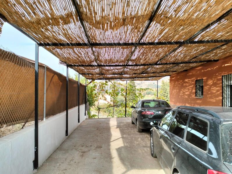 Foto f79efcc1-486e-43bb-a8ad-18a3d5b852f2. Masia amb xemeneia calefacció aparcament piscina a Cártama