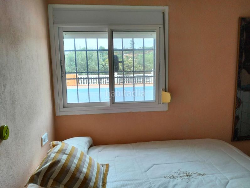 Foto fe322f50-8859-4313-9cc1-216ff7dfa80b. Masia amb xemeneia calefacció aparcament piscina a Cártama