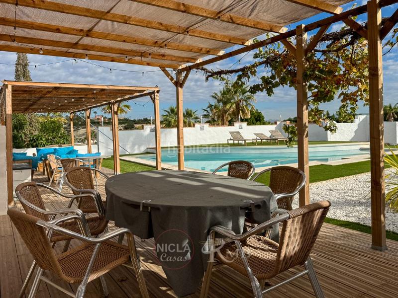 Foto 9e208938-967f-4a81-bb7a-d899fa39ca06. House with heating pool in Vera ciudad Vera