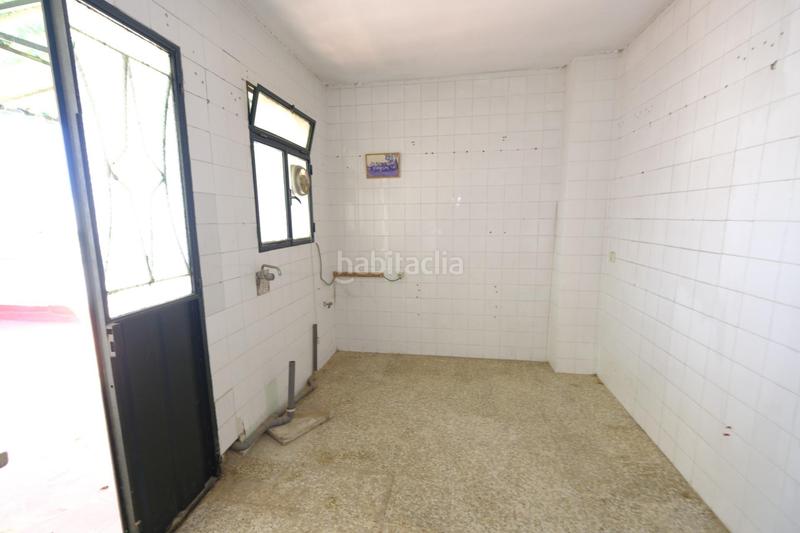 Foto ec4253f0-2305-48dc-b716-b75ad5c9387f. Local comercial bar zona silos con vivienda en La Paz Alcalá de Guadaira