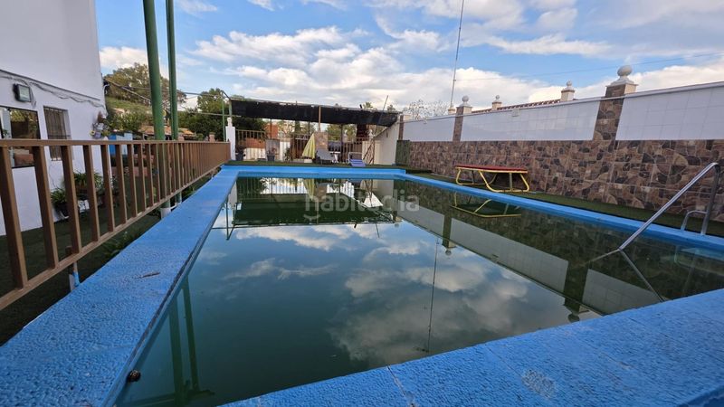 Foto 5e7c40b8-02b5-47f7-a31a-fac631a5c372. Chalet con piscina in Oromana Alcalá de Guadaira