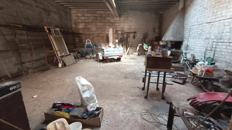 Foto b4133f82-b904-464c-a106-e1fbd9651b73. Casa  de pueblo con gran almacén en la parte alta en Camarasa