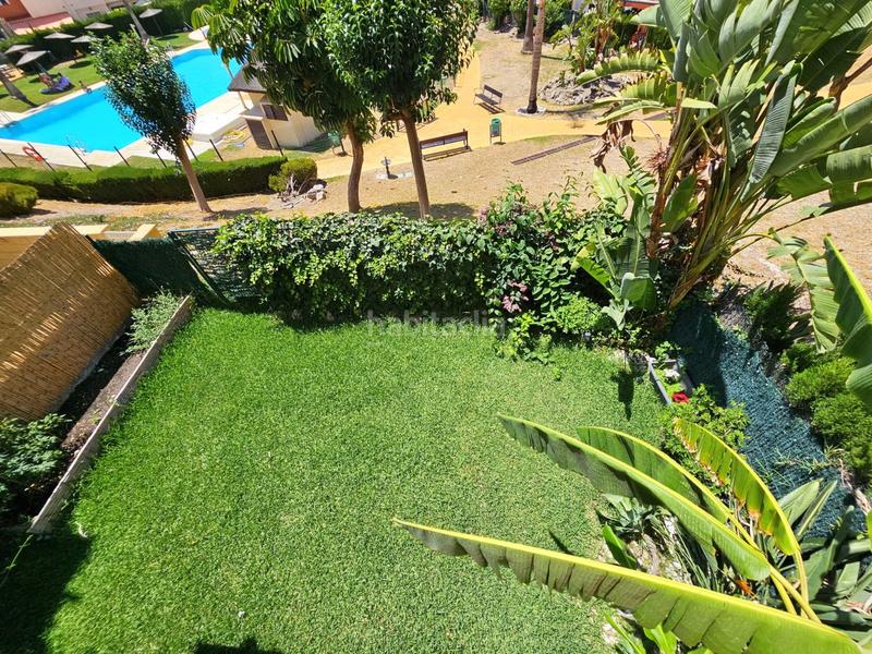 Foto 23340e3e-78e5-4178-a30c-76df1057842f. Maison jumelée avec cheminée parking piscine dans Añoreta Golf - Paraíso del Sol Rincón de la Victoria