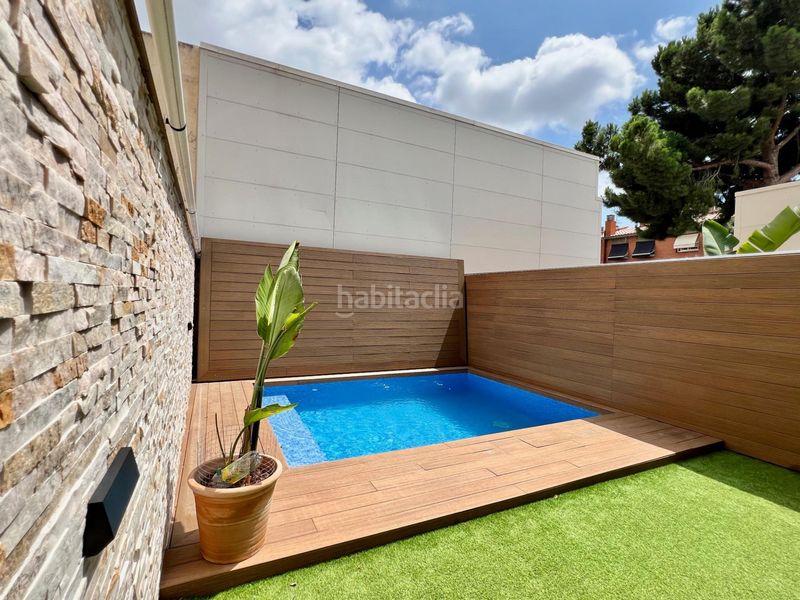 Foto 4008af48-5d42-4c7d-a32e-04e4c449a101. Casa amb calefacció aparcament piscina a Eixample Sabadell