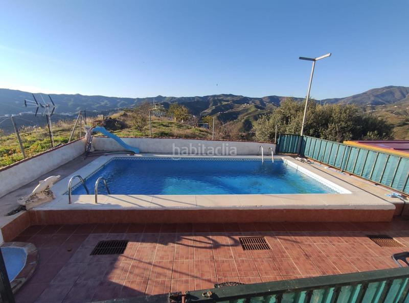 Foto 61780b54-76ad-435f-ae28-880438477903. Masia amb piscina a Cútar