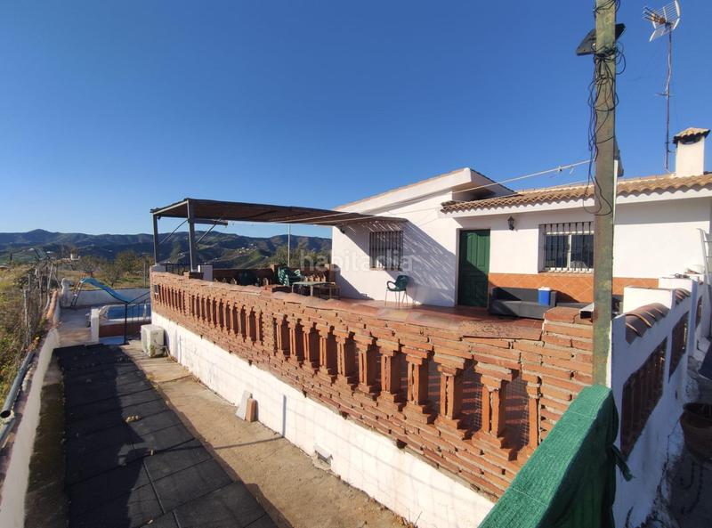 Foto d129105c-7daf-4e97-b534-e0aabdf15c35. Masia amb piscina a Cútar