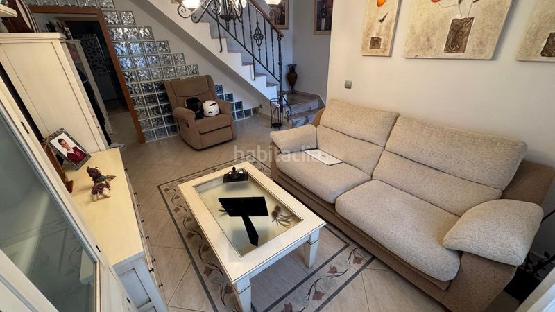 Foto f197c82f-5369-4360-98ba-de808ccb5e32. Casa aparellada amb aparcament a Palma - Palmilla Málaga