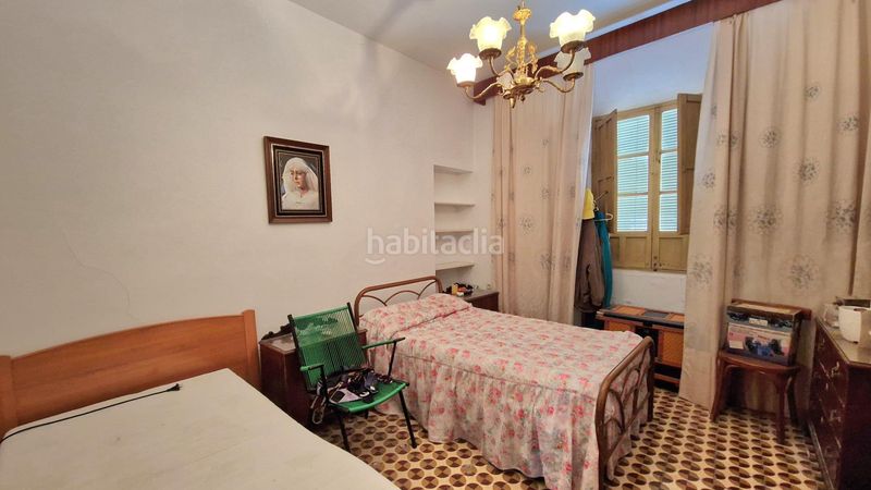 Foto 36f5f8c4-5b4b-43bf-b32c-85ead6119174. Casa adossada amb aparcament a Centro Antequera