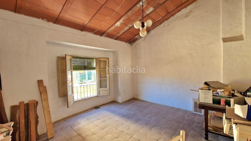 Foto a8f14d44-90f1-42c6-931b-fd915f256b0e. Casa adossada amb aparcament a Centro Antequera