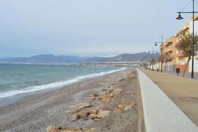 Foto 36a3b863-22c1-480a-9f11-f7874fbf93c7. Piso vive en primera línea de playa en Balerma en Ejido (El)