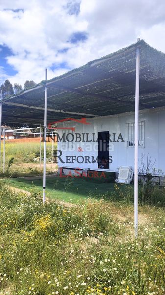 Foto 3eac9263-de27-44b8-ab99-72617705025a. Alquiler finca rústica parcela de 6.500 m² con casa prefabricada –venta y/o alquiler con opción a compra en Carranque