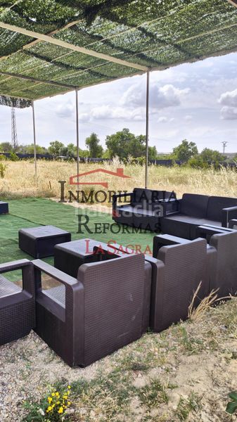 Foto 57381ee5-ab88-4def-9d96-349fe29451b9. Alquiler finca rústica parcela de 6.500 m² con casa prefabricada –venta y/o alquiler con opción a compra en Carranque