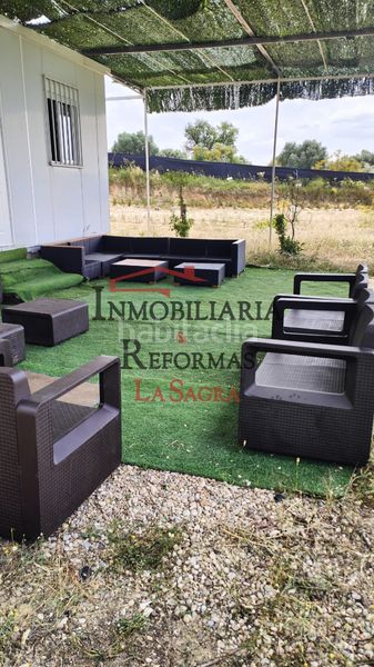 Foto c3cf6426-82f3-4e17-b1b1-bfd14635e500. Alquiler finca rústica parcela de 6.500 m² con casa prefabricada –venta y/o alquiler con opción a compra en Carranque