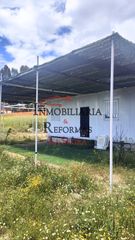 Chalet in Carranque. Parcela de 6.500 m² con casa prefabricada –venta y/o alquiler co