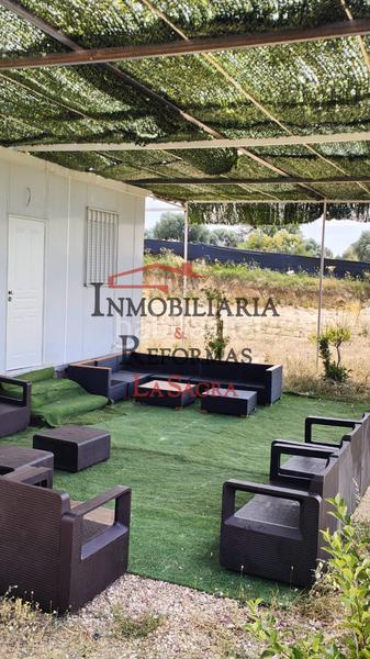 Foto ffab628c-695a-41f1-9613-846011b67359. Finca rústica parcela de 6.500 m² con casa prefabricada –venta y/o alquiler con opción a compra en Illescas