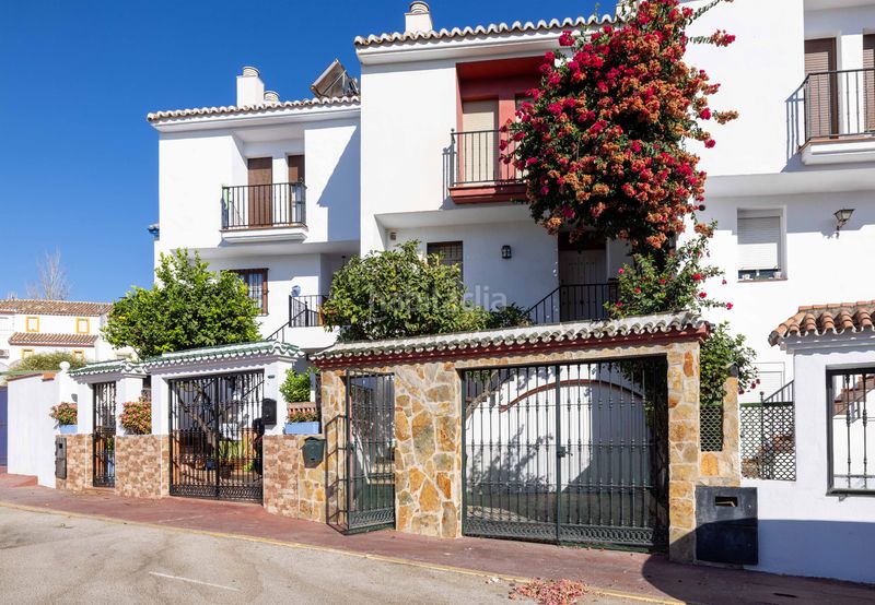 Foto 52973ef7-958a-4f3c-8640-5d1518b4604d. Casa adossada amb xemeneia aparcament a Torrecilla - La Cañada Marbella