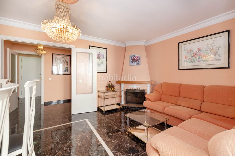 Foto b7ff7034-fd9b-45e2-9df1-59cc6a907ee4. Casa adossada amb xemeneia aparcament a Torrecilla - La Cañada Marbella