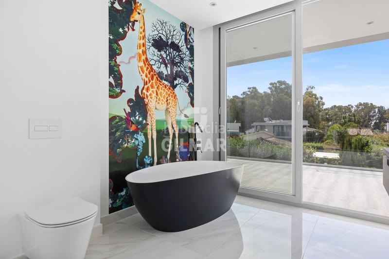 Foto 6a9d7f47-0565-4614-8f5b-0aa4592a1fb1. Chalet avec chauffage parking piscine dans Nueva Alcántara Marbella