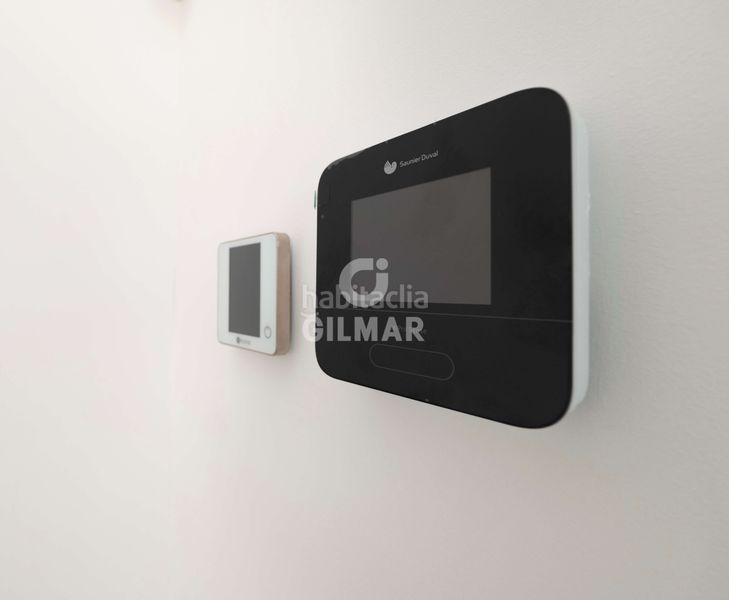 Foto dfd6a6c9-7536-4df3-841a-641e23303329. Casa aparellada amb calefacció aparcament piscina a Estepona