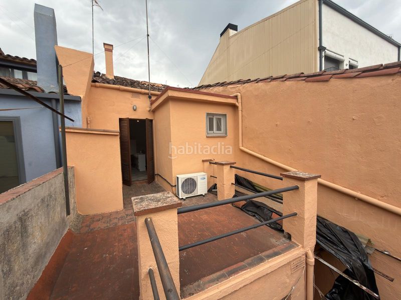 Foto 543850e3-ee93-4218-b754-538ae5125699. Casa adossada a Riells i Viabrea
